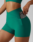 Basic crossover hip lift side pocket track yoga shorts